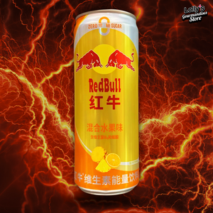 Canette de Redbull chinois Orange Ananas, de couleur orange et jaune et disposée sur un fond noir et orange avec des éclairs. 